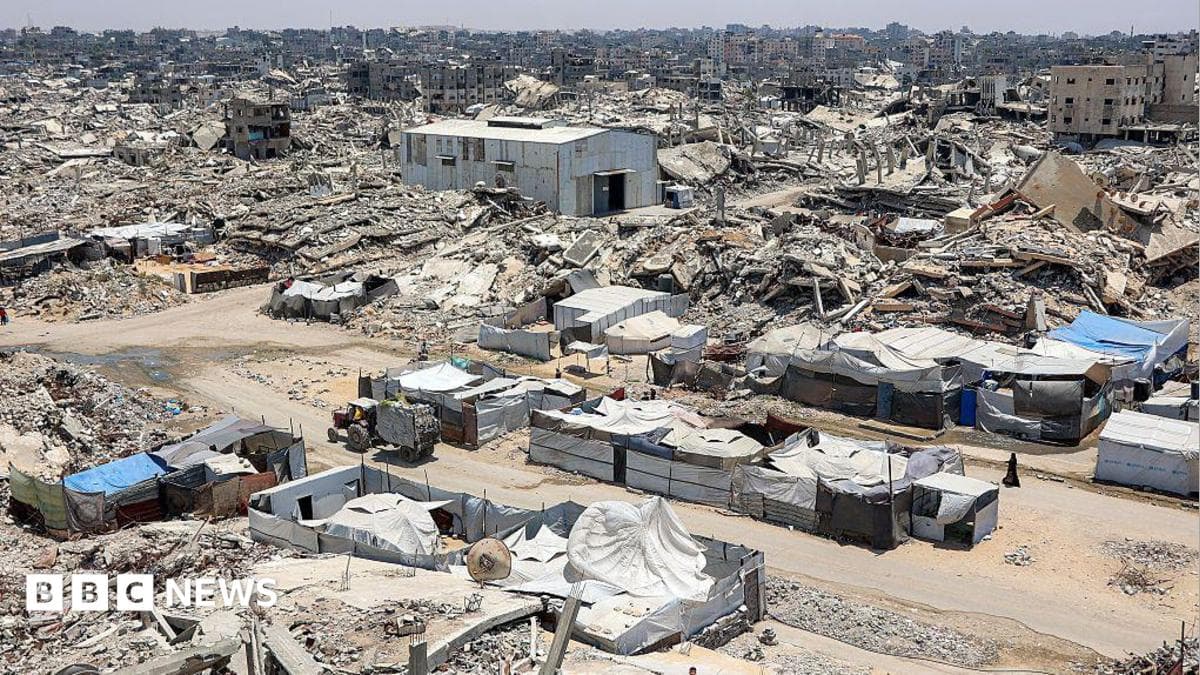 A landscape shows sheer destruction across Gaza. Rubble, dust and dirt.