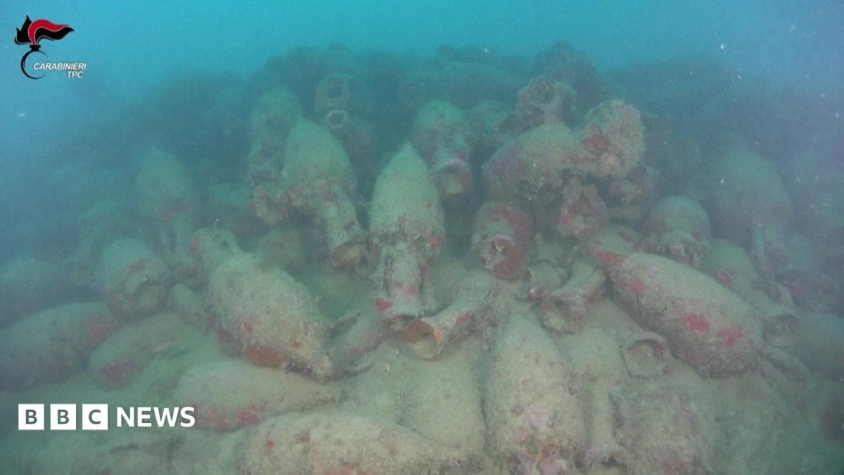 Dozens of barnacle-crusted jars seen on the sea bed