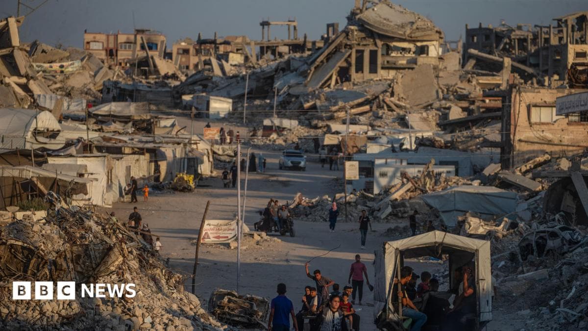 Displaced Palestinians walk between destroyed houses in Jabaliya, northern Gaza City, 07 August 2026.