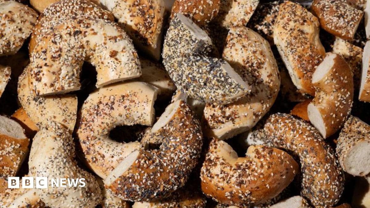Everything bagels baked with a mix of toppings including garlic flakes, onion flakes, poppy seeds, sesame seeds and salt