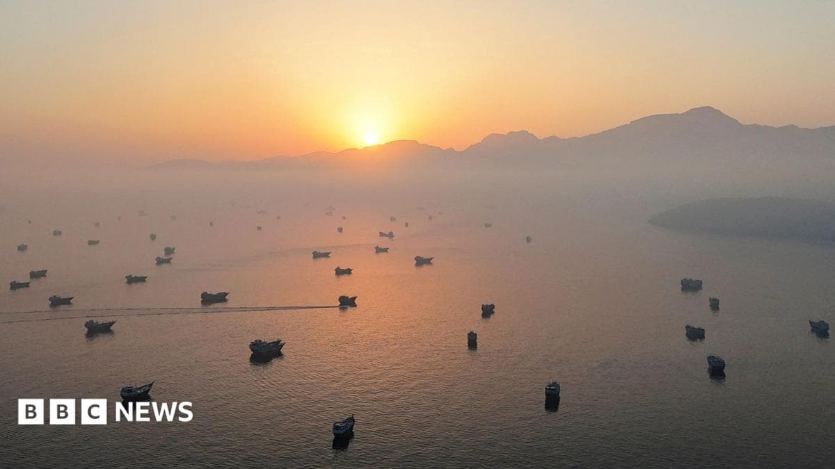 Vessels in the Strait of Hormuz, as seen from Musandam, Oman, June 15, 2026